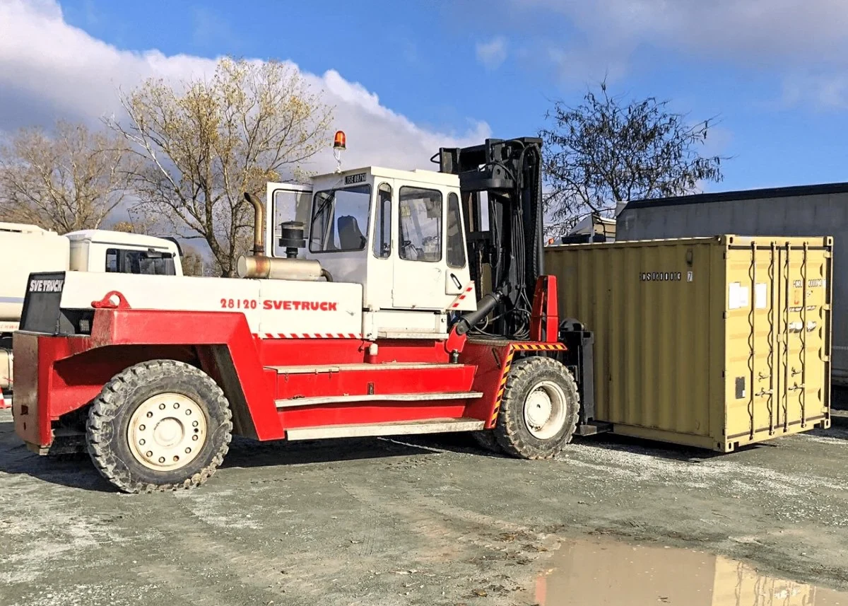 Kran Svetruck with a container on site — container transport and handling Constanța