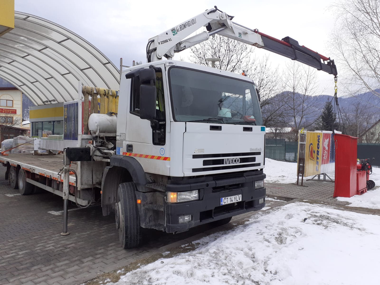 Long-Distance Totem Transportation with the Help of a Mobile Crane-Truck