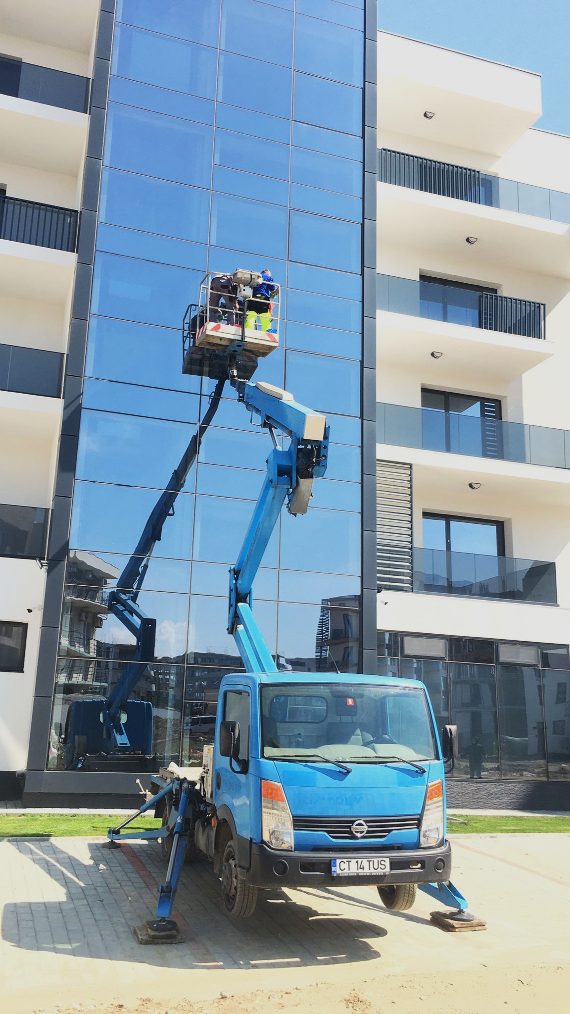 window cleaning using a truck-mountedboom lift