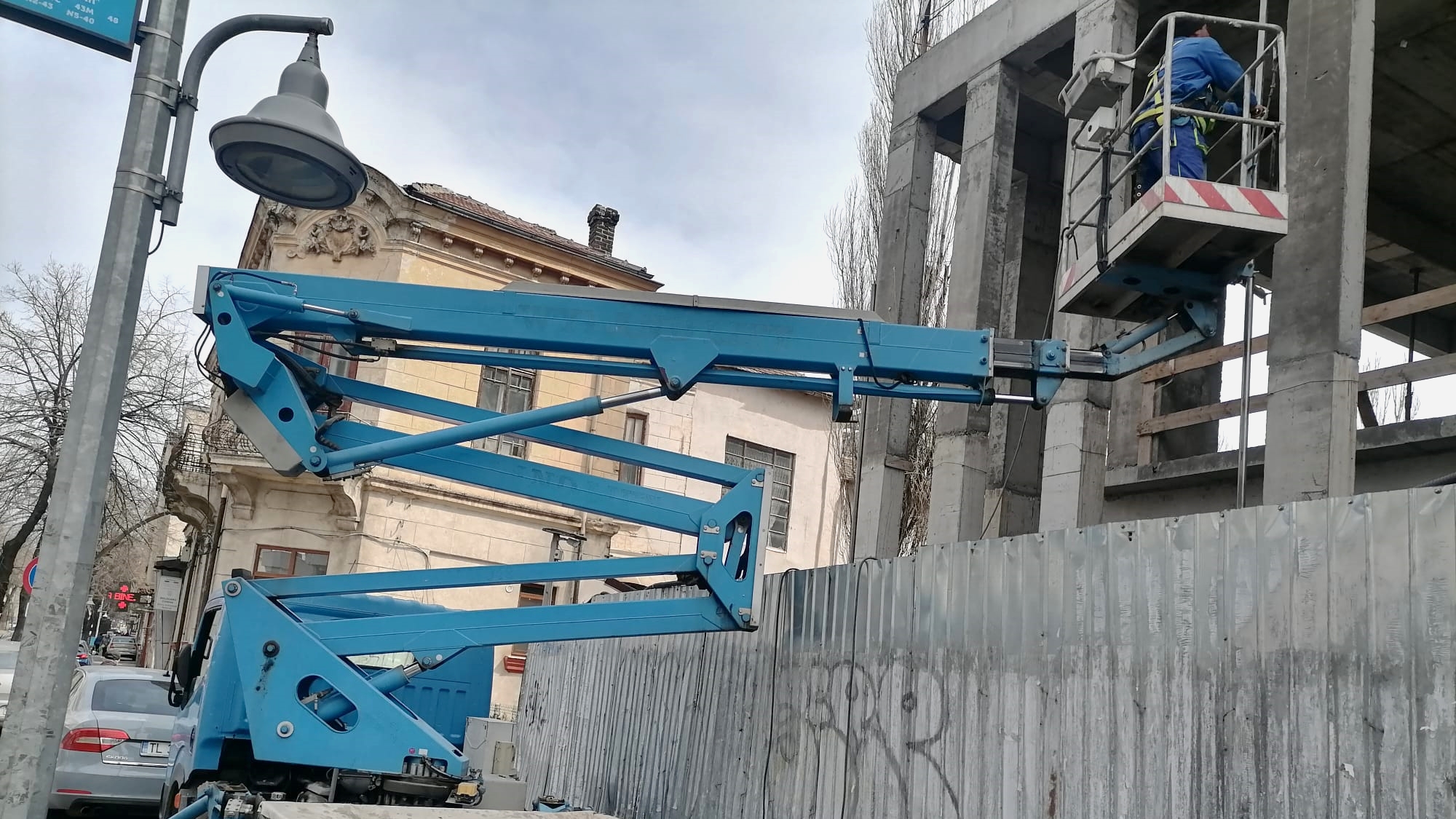 Scaffolding installation using a truck-mounted boom lift