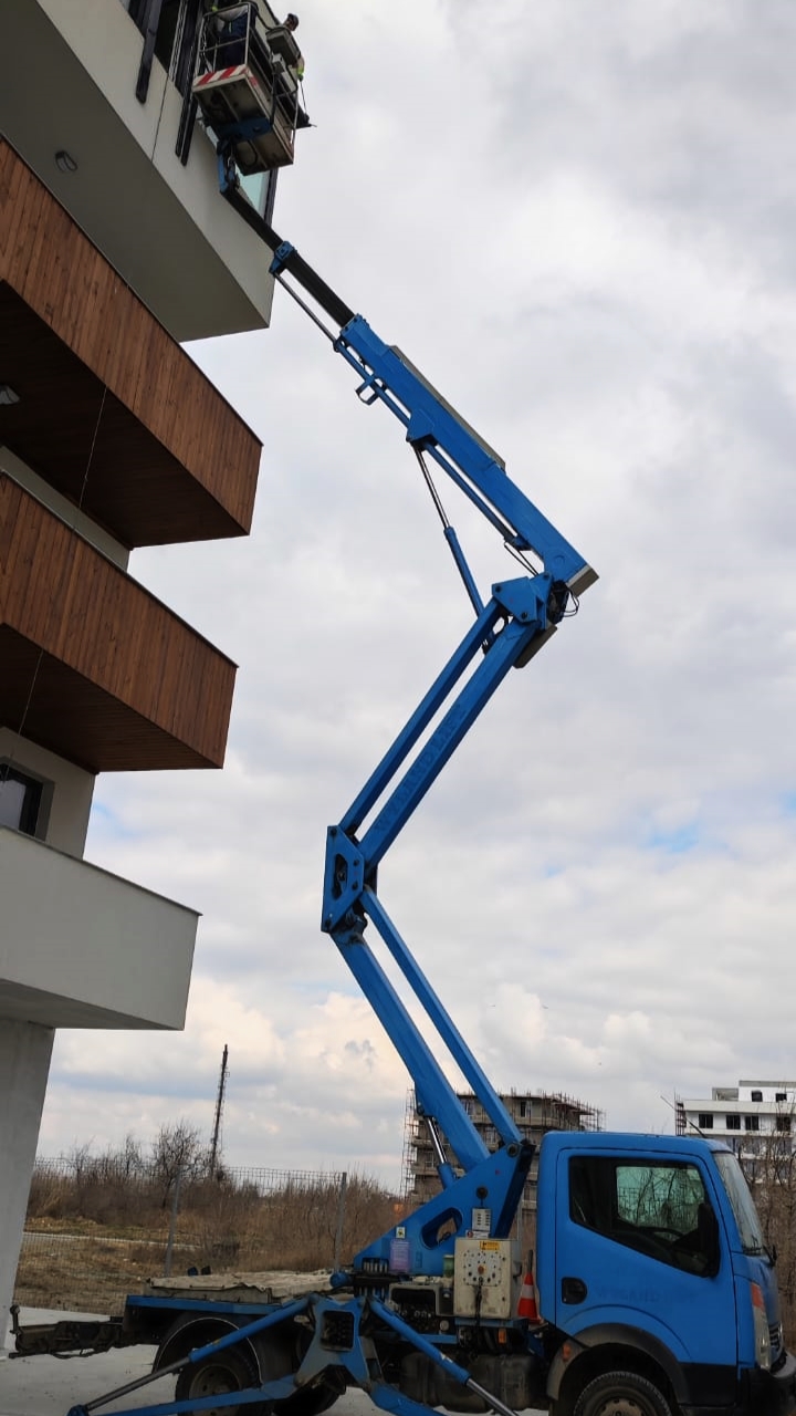 installation of roller shutters using the truck-mounted boom lift