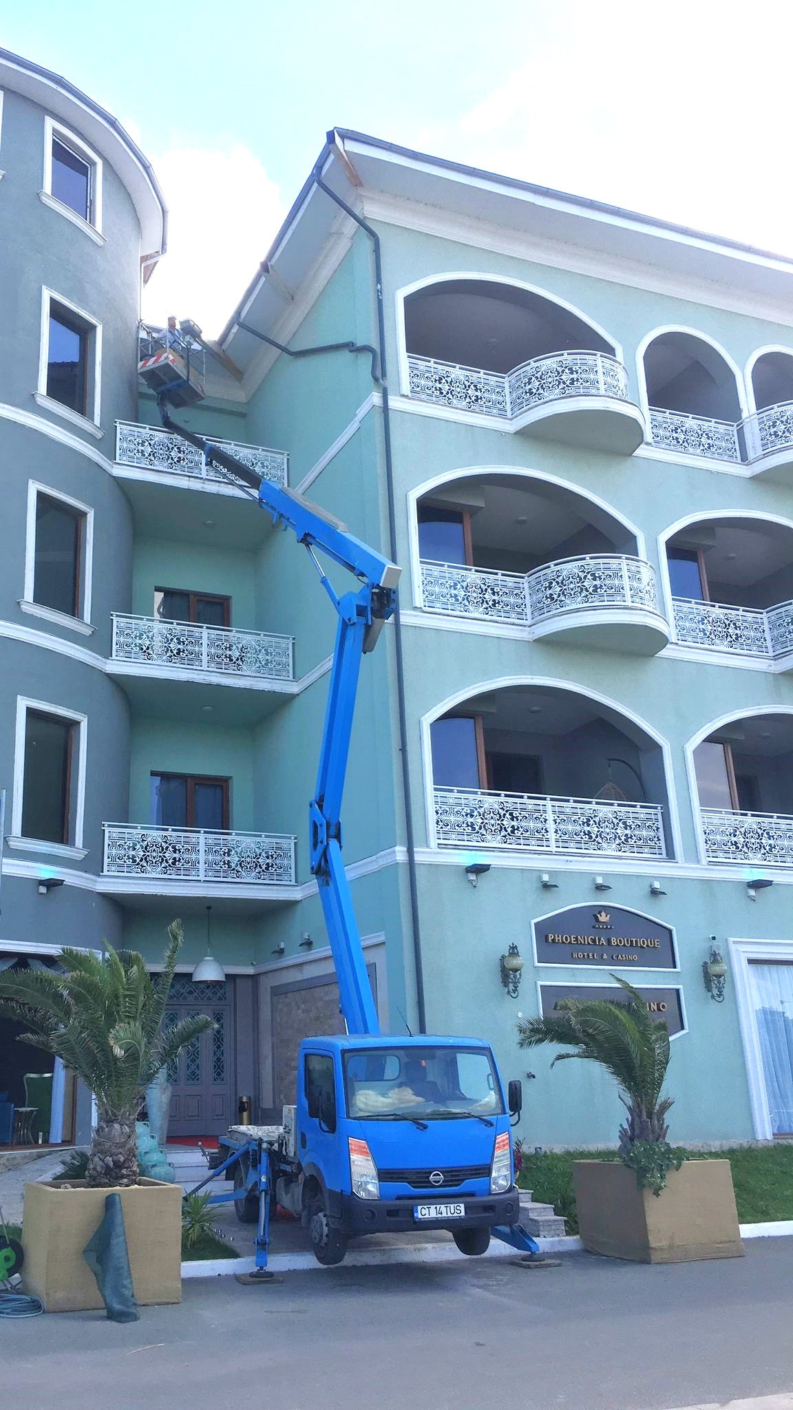 Wire mounting using a truck-mounted boom lift