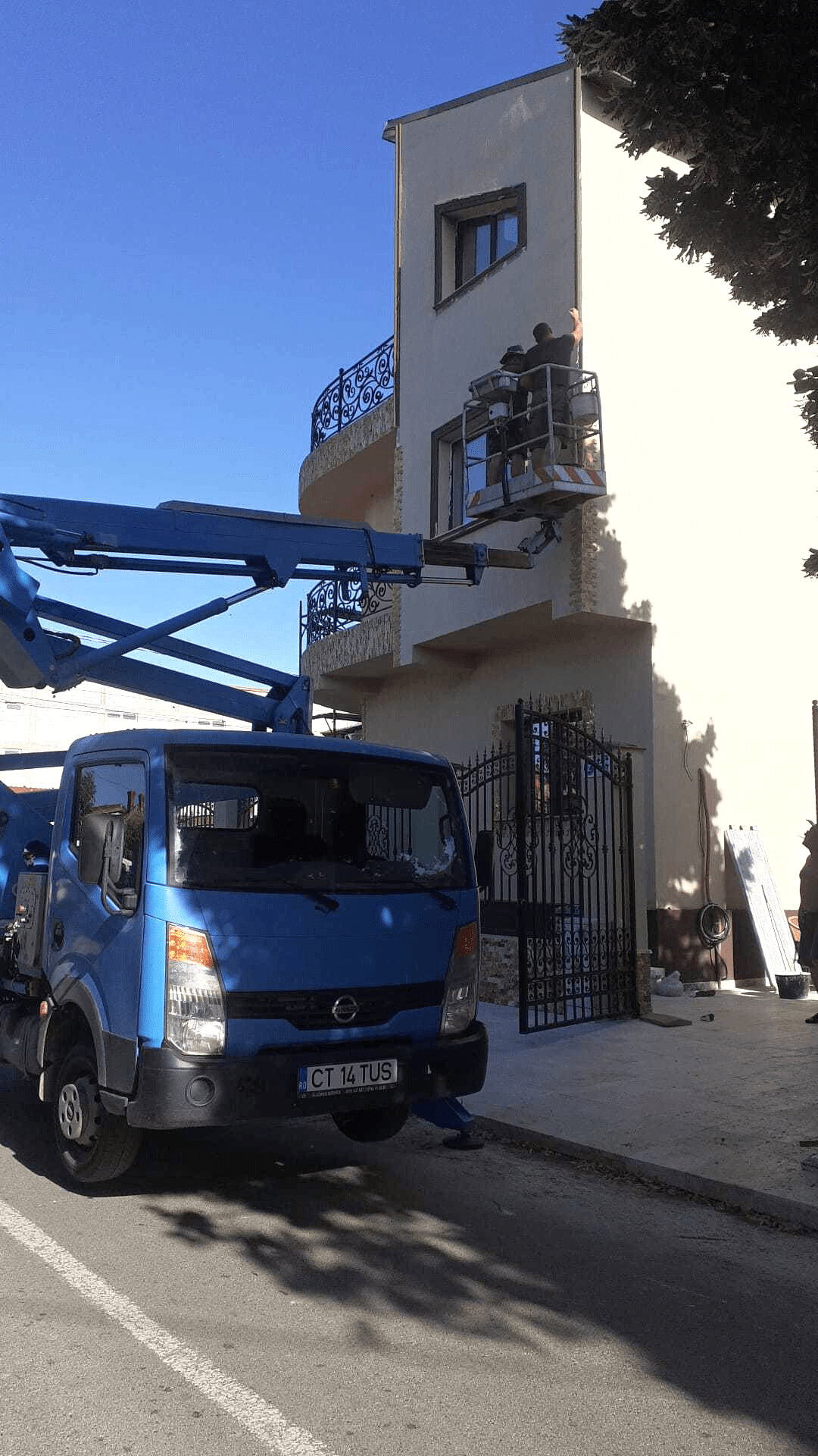 Decorative Stones Mounting Project Using a Truck-Mounted Boom Lift