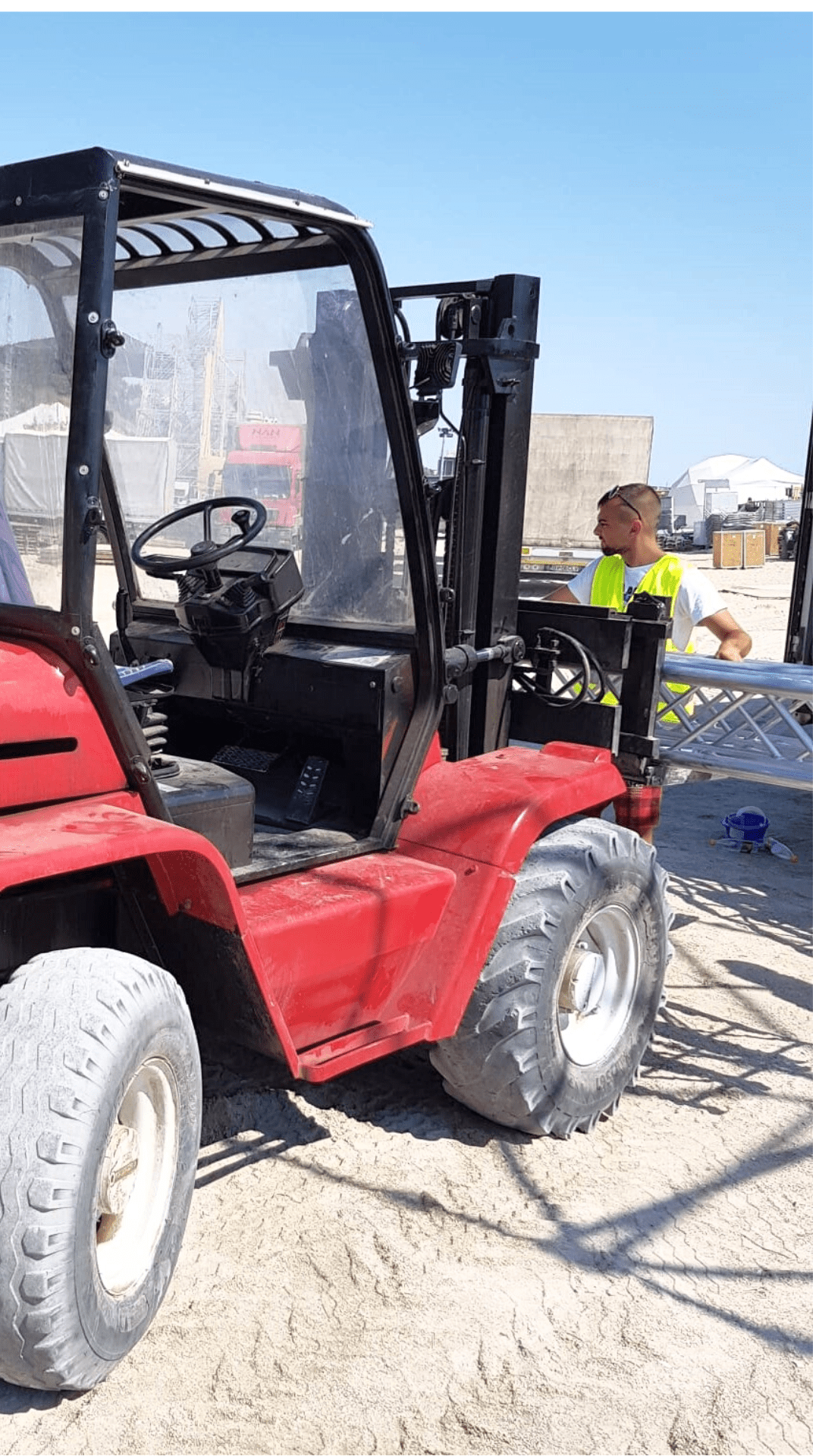 Metallic structure relocation using an all-terrain forklift