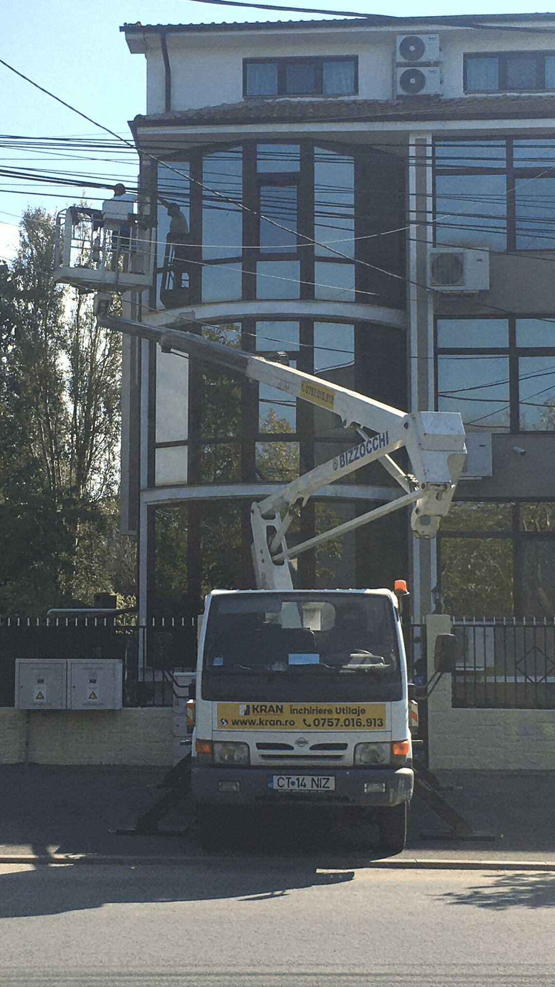 Windows Cleaning at Heights using Truck-mounted boom lift