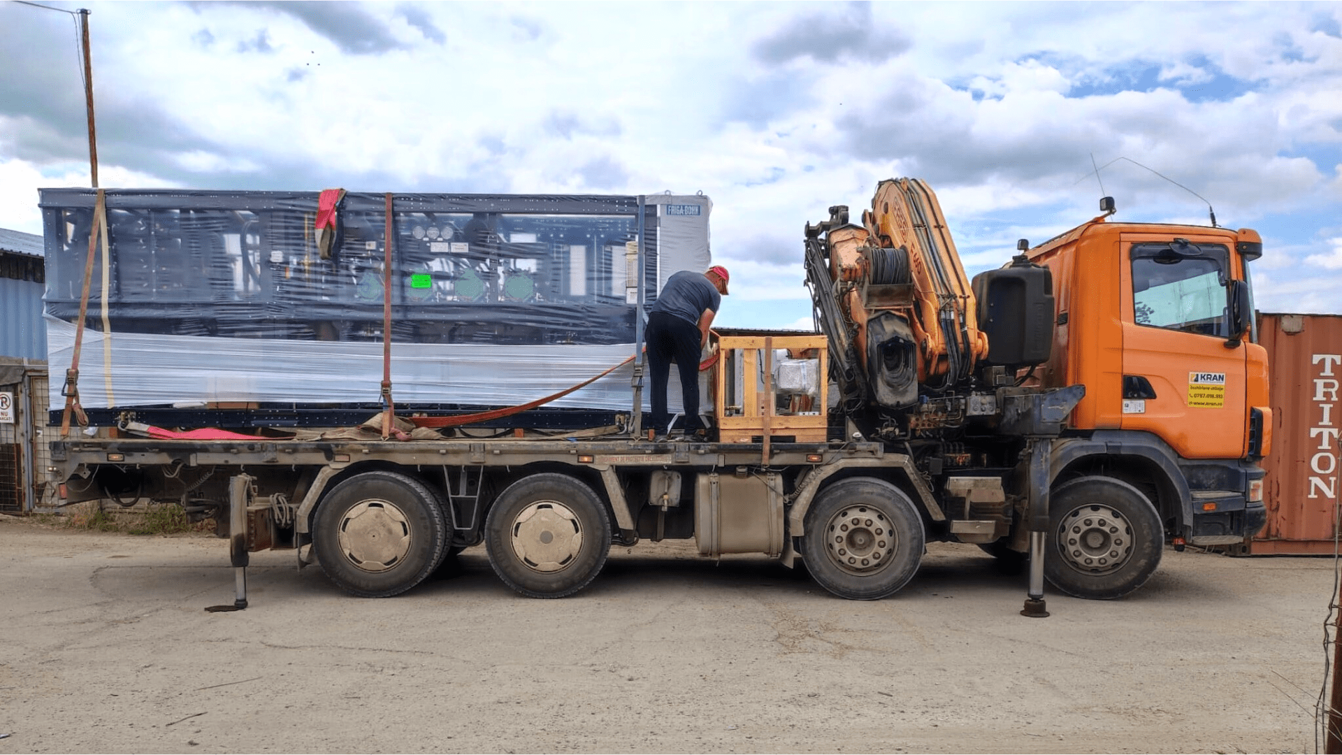 Unloading Heavy Machinery using a Truck Crane and Heavy Duty Forklift
