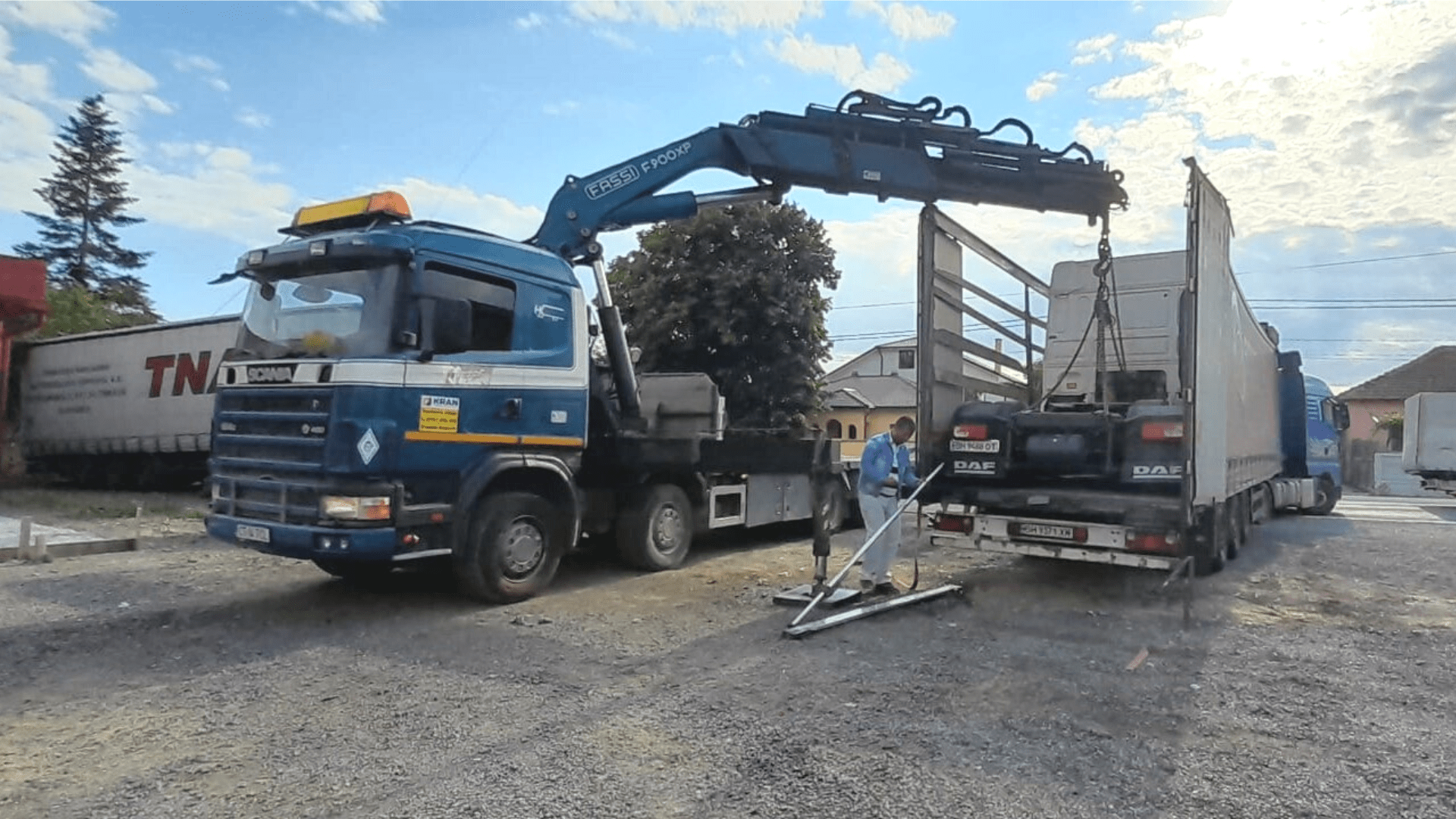 Truck cab unloading using a mobile crane